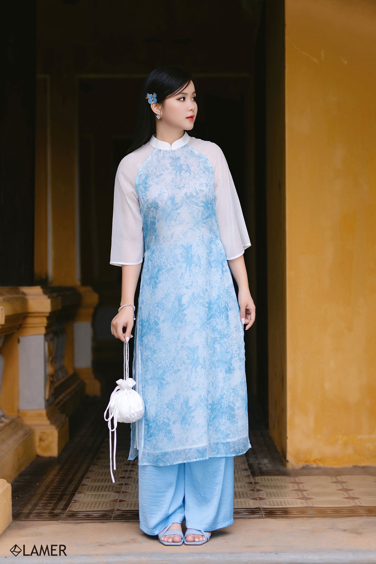 Mẹo diện áo dài cho người có bụng mỡ